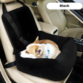 A black car seat pet booster seat installed on a beige car seat, with a brown and white dog resting inside. A white label at the top reads 'Black'.