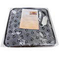 A packaged pet heating pad with a gray paw-print pattern, included with an instruction sheet and a white power controller, all sealed in clear plastic.