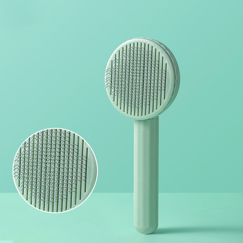 Green handheld cleaning brush with textured head on a light green background