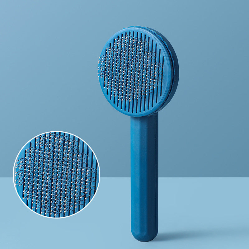 Blue pet grooming brush with close-up detail on a blue background