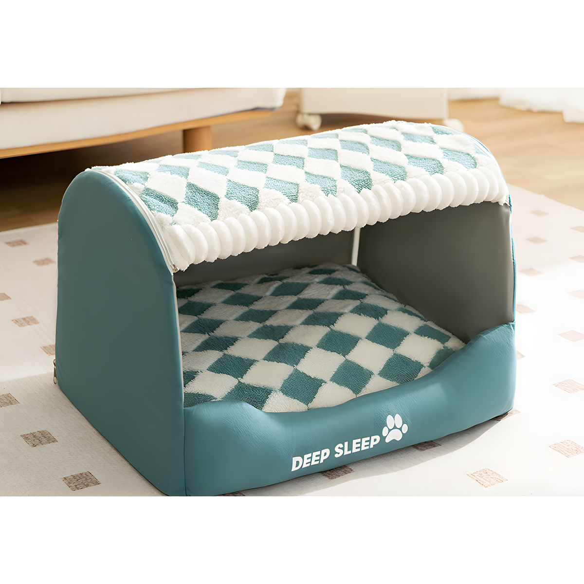 A teal and white checkered pet bed with a soft padded roof and the words 'DEEP SLEEP' printed on the front, placed on a patterned rug in a home setting.