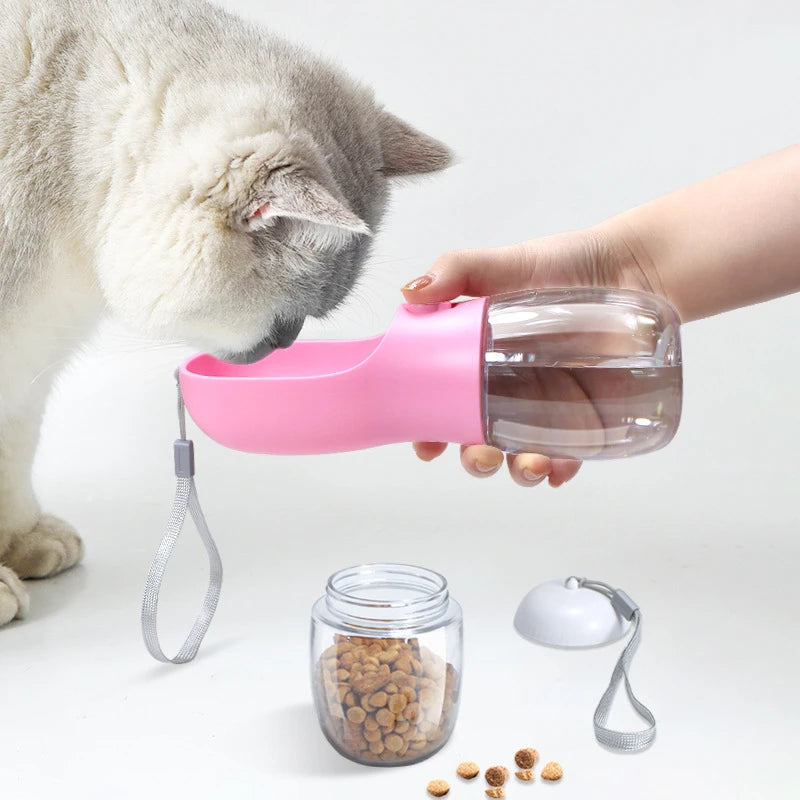 Pink pet water bottle being held by a hand with a cat drinking from it, and a jar of pet food on a white background.