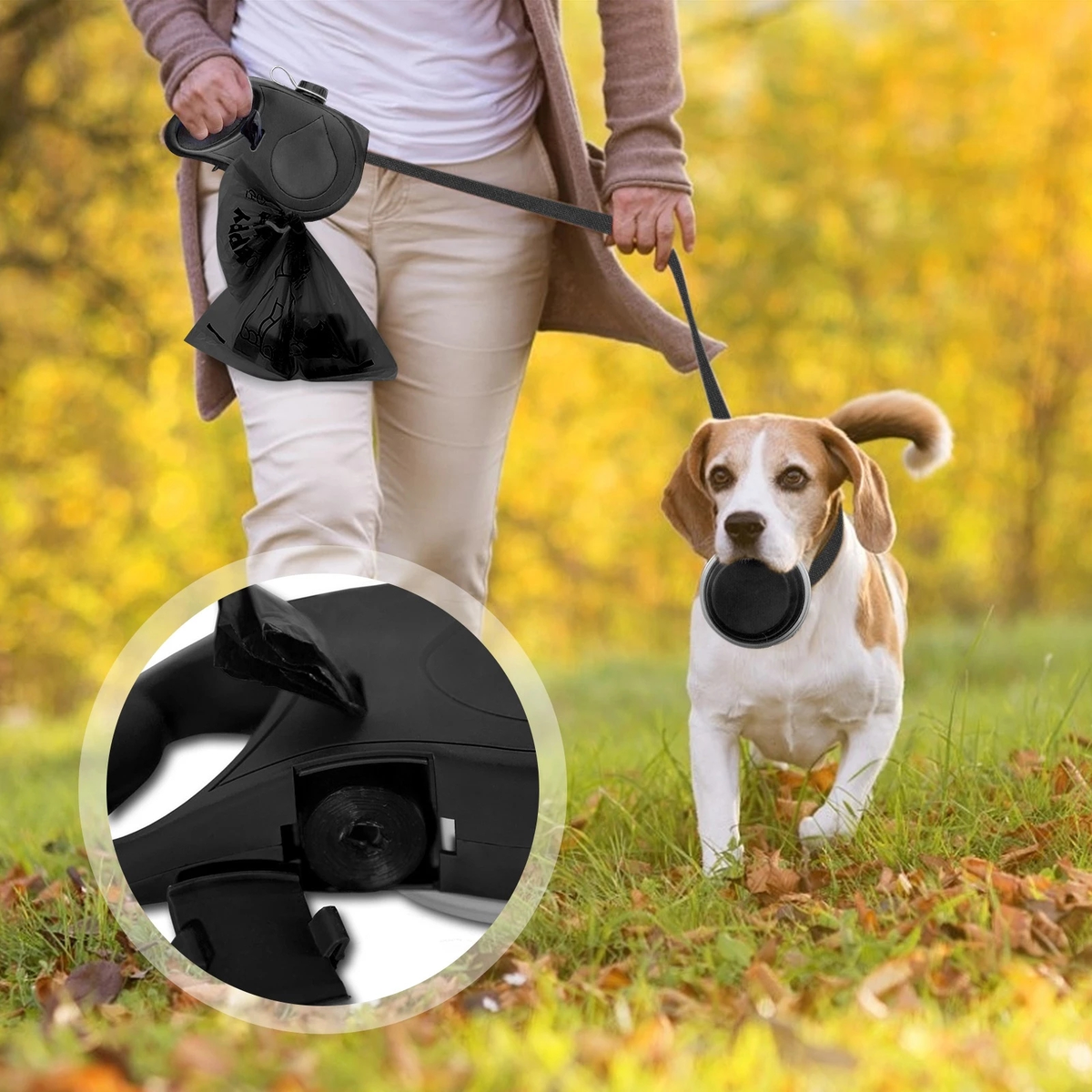 Person walking a dog with a retractable leash and waste bag dispenser in an autumn setting.