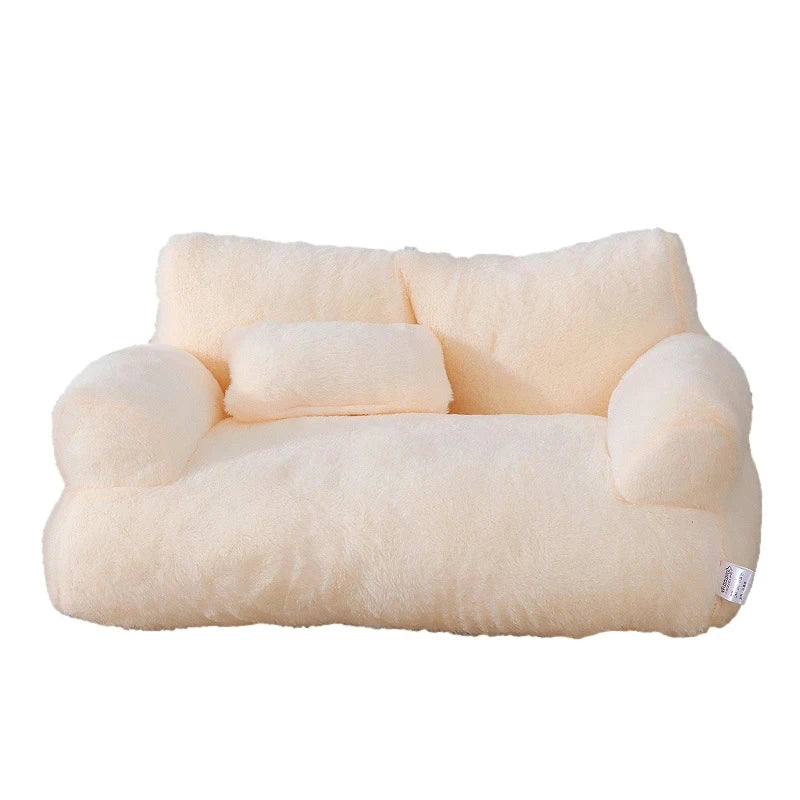Cream-colored pet bed with a soft texture on a white background